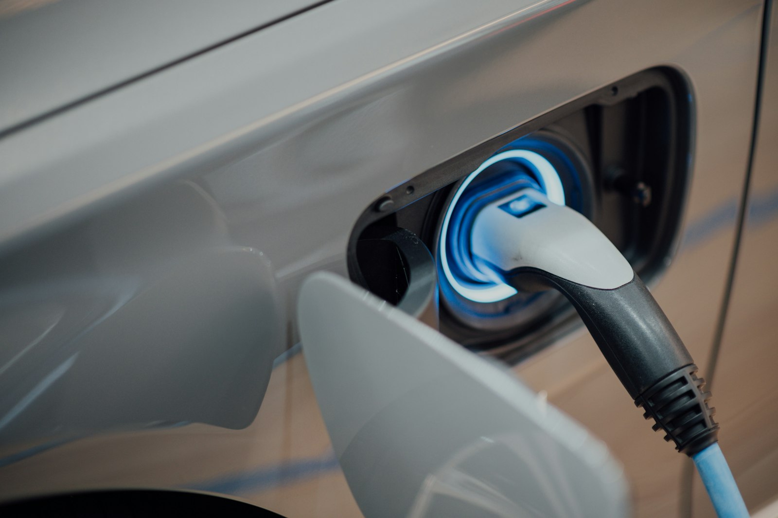 Modern hybrid and electric cars on a bright road